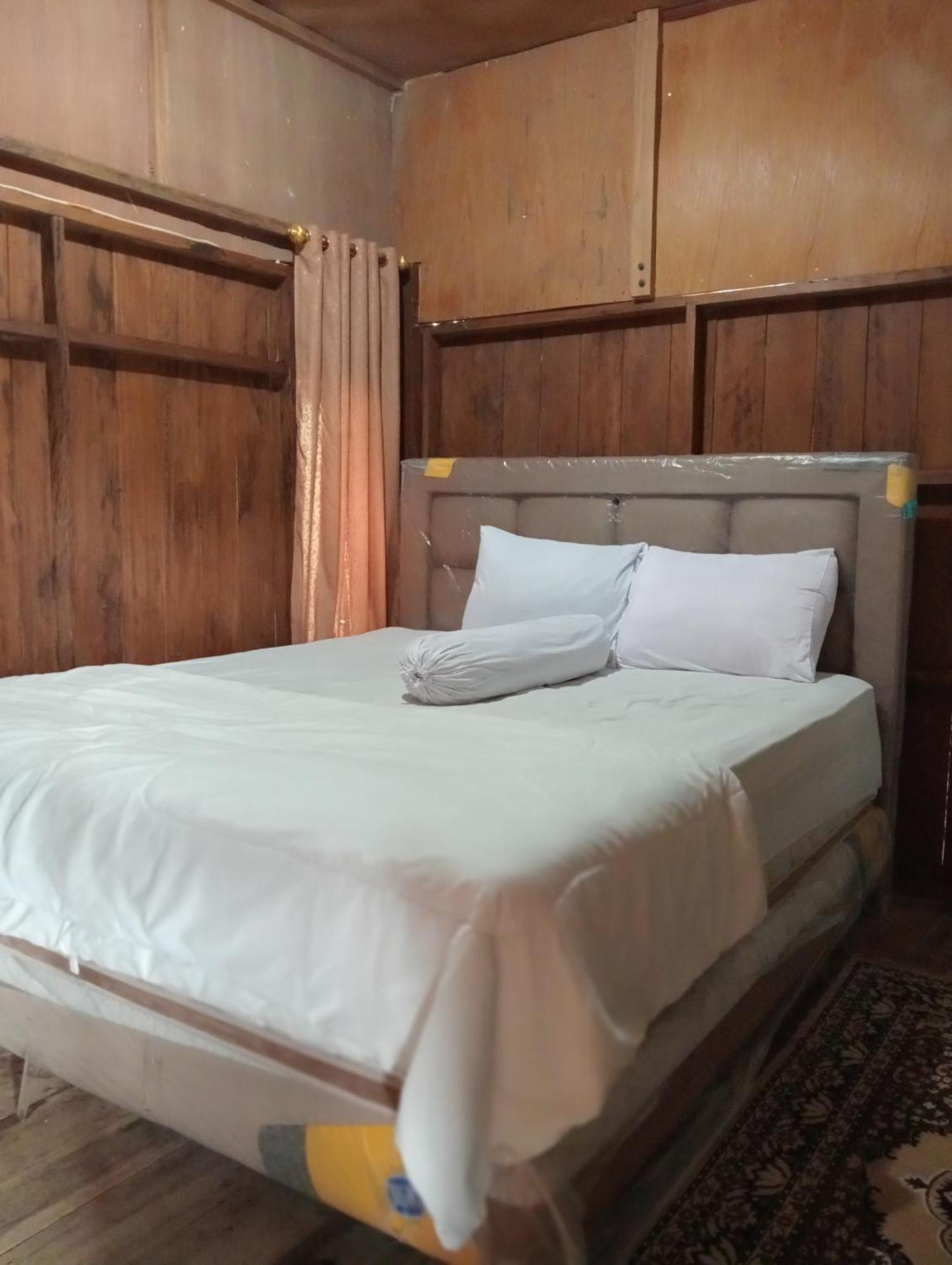 Tiu Batu Homestay Alas Exterior foto